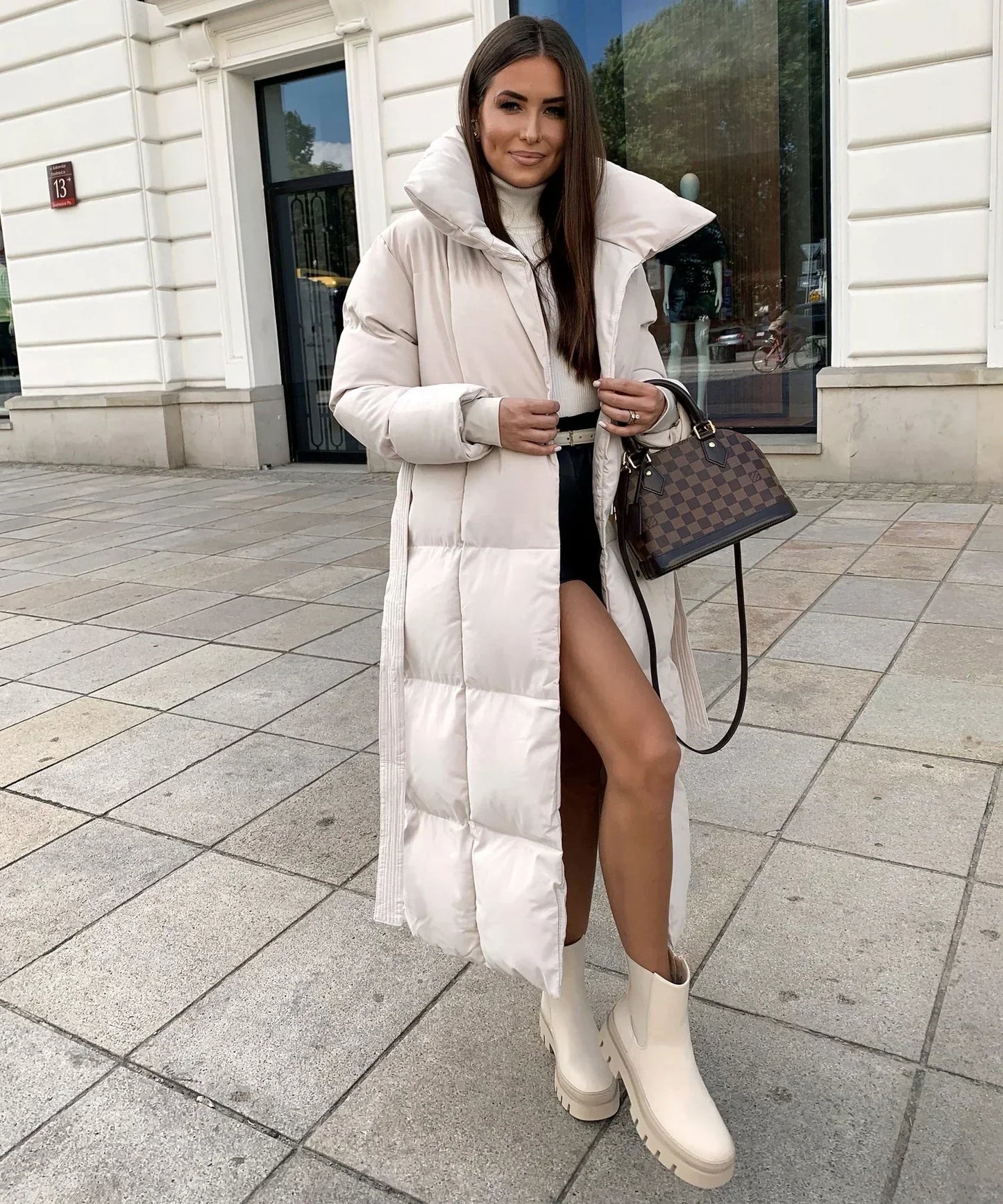 LuxeFrost – Lange Pufferjas met Taille