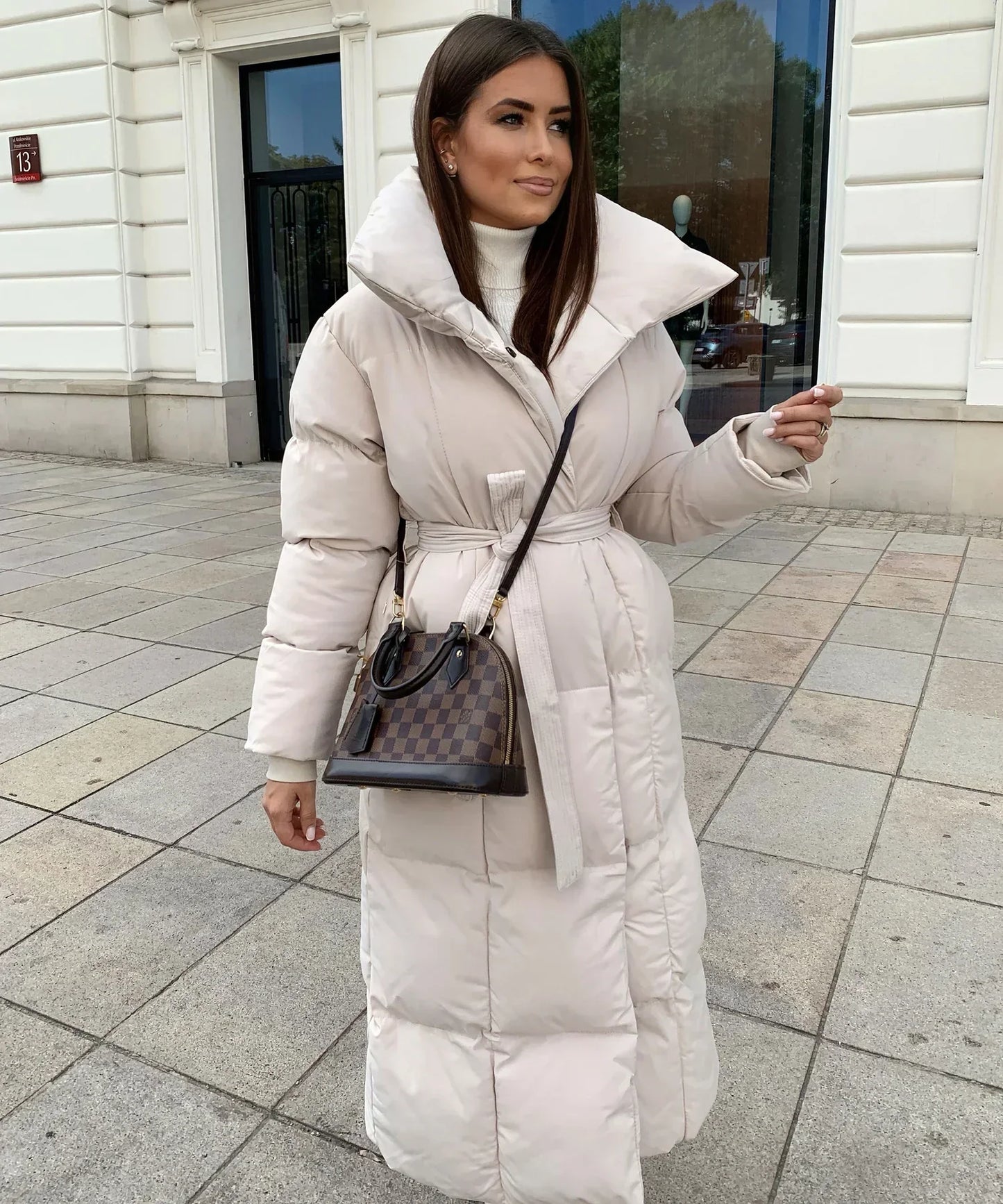 LuxeFrost – Lange Pufferjas met Taille