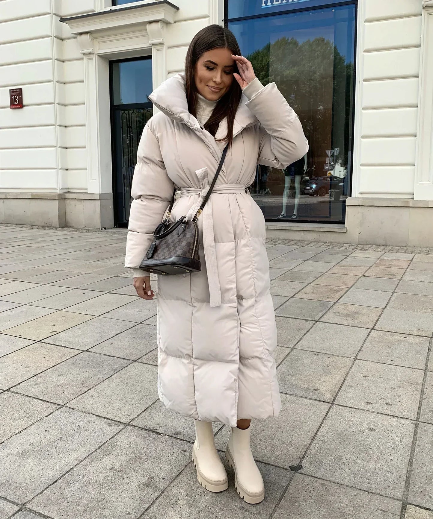 LuxeFrost – Lange Pufferjas met Taille